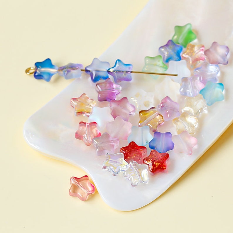 Perles en verre en forme d'étoile à cinq branches (10 perles)