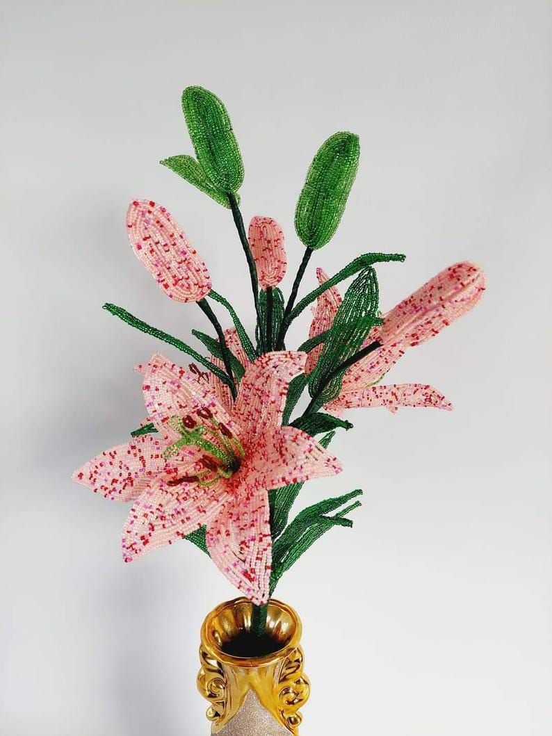 Composition florale artificielle Lys perlé 60 cm