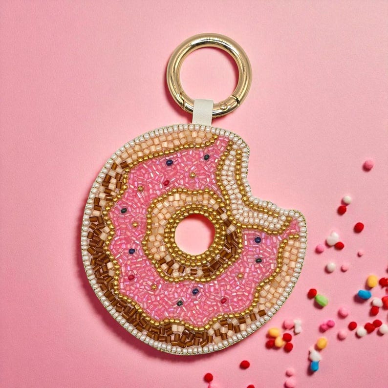 Porte-clés perles en forme de donut rose avec paillettes et mousqueton doré