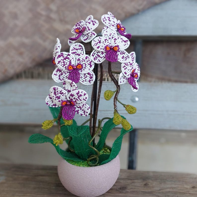 Orchidée topiaire artificielle perlée en pot