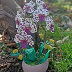 Orchidée topiaire artificielle perlée en pot