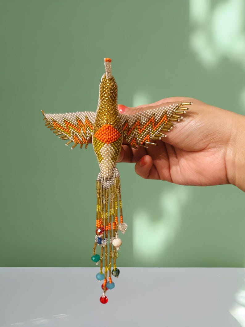 Bijou attrape-soleil colibri en perles