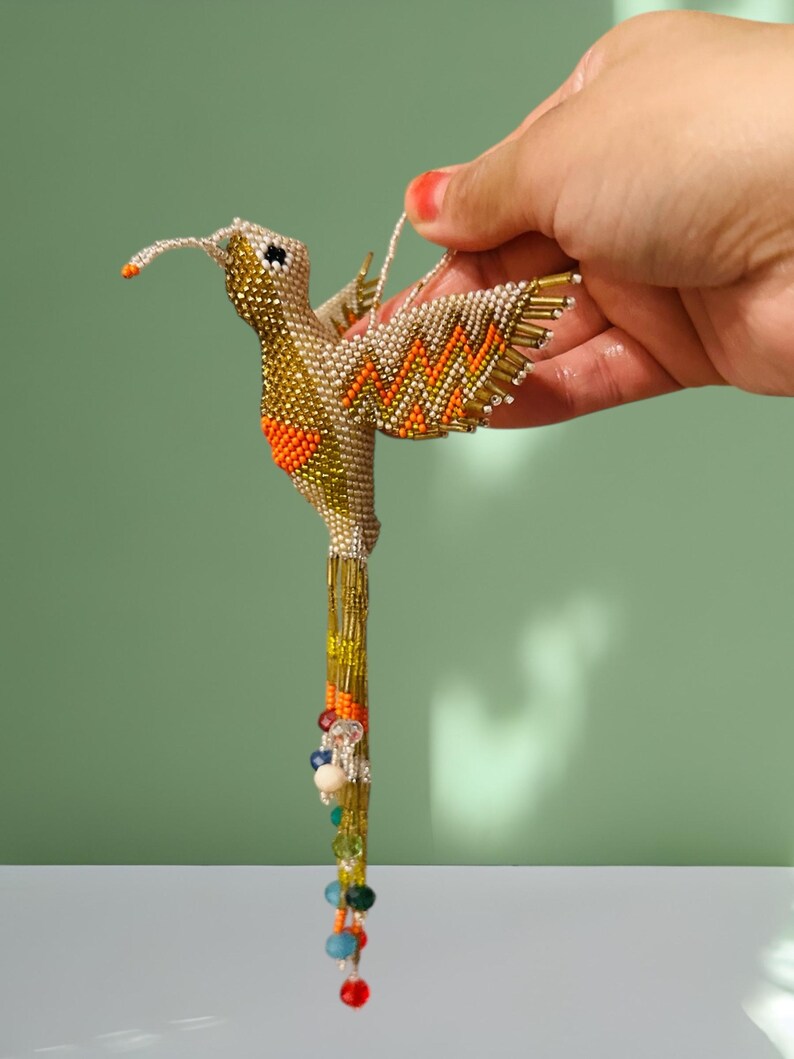 Bijou attrape-soleil colibri en perles